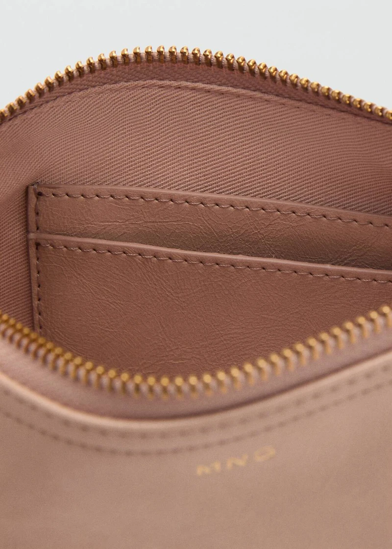 Tumbled leather-effect clutch