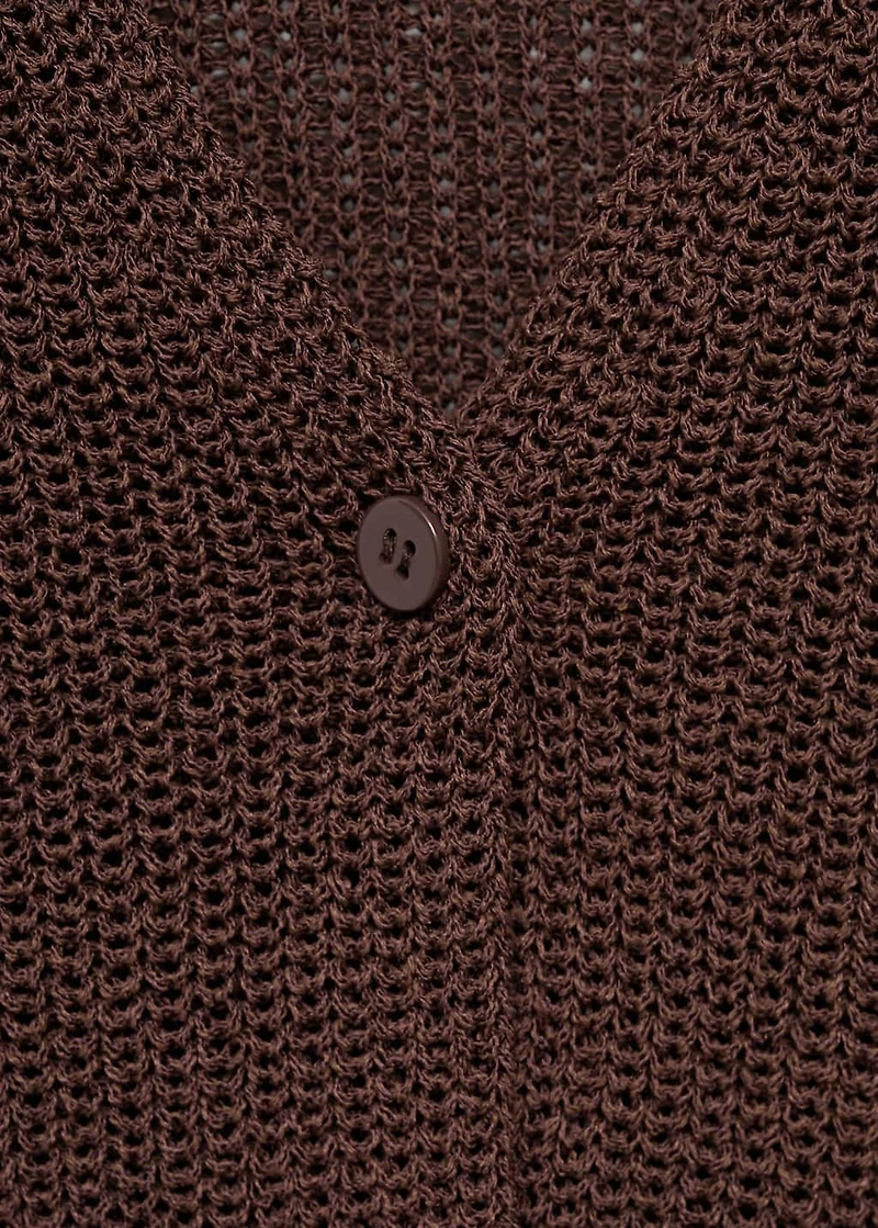Knitted vest with lace pattern