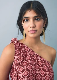 Asymmetrical blouse with bow at the neck