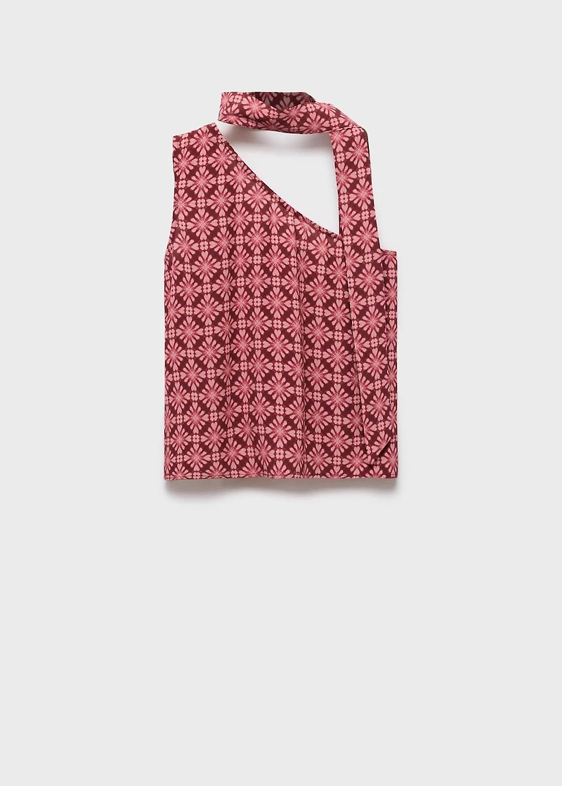 Asymmetrical blouse with bow at the neck