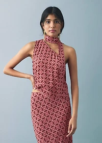 Asymmetrical blouse with bow at the neck