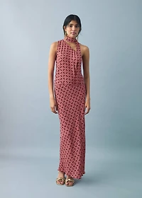 Asymmetrical blouse with bow at the neck