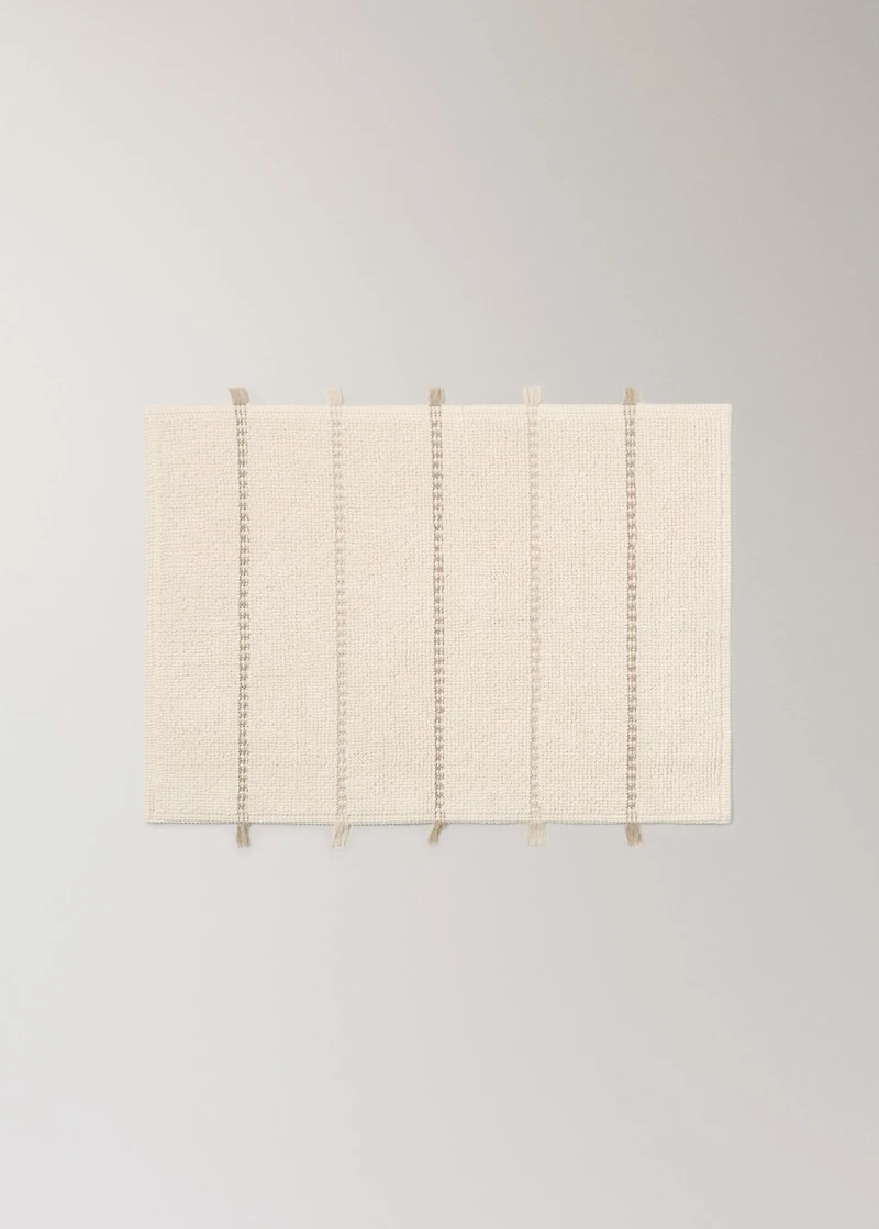 Striped bath mat with fringe detail