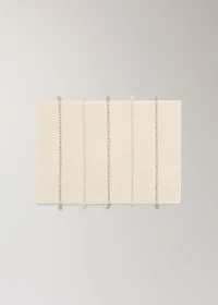Striped bath mat with fringe detail