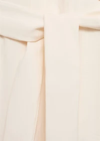 Halter-neck jumpsuit with belt