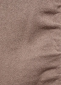 Asymmetrical knitted top with straps