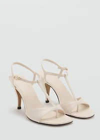Heeled leather sandals with straps