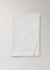 Hand-embroidered oval linen tablecloth for 6 to 8 diners