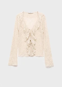 Lace blouse with ruffles