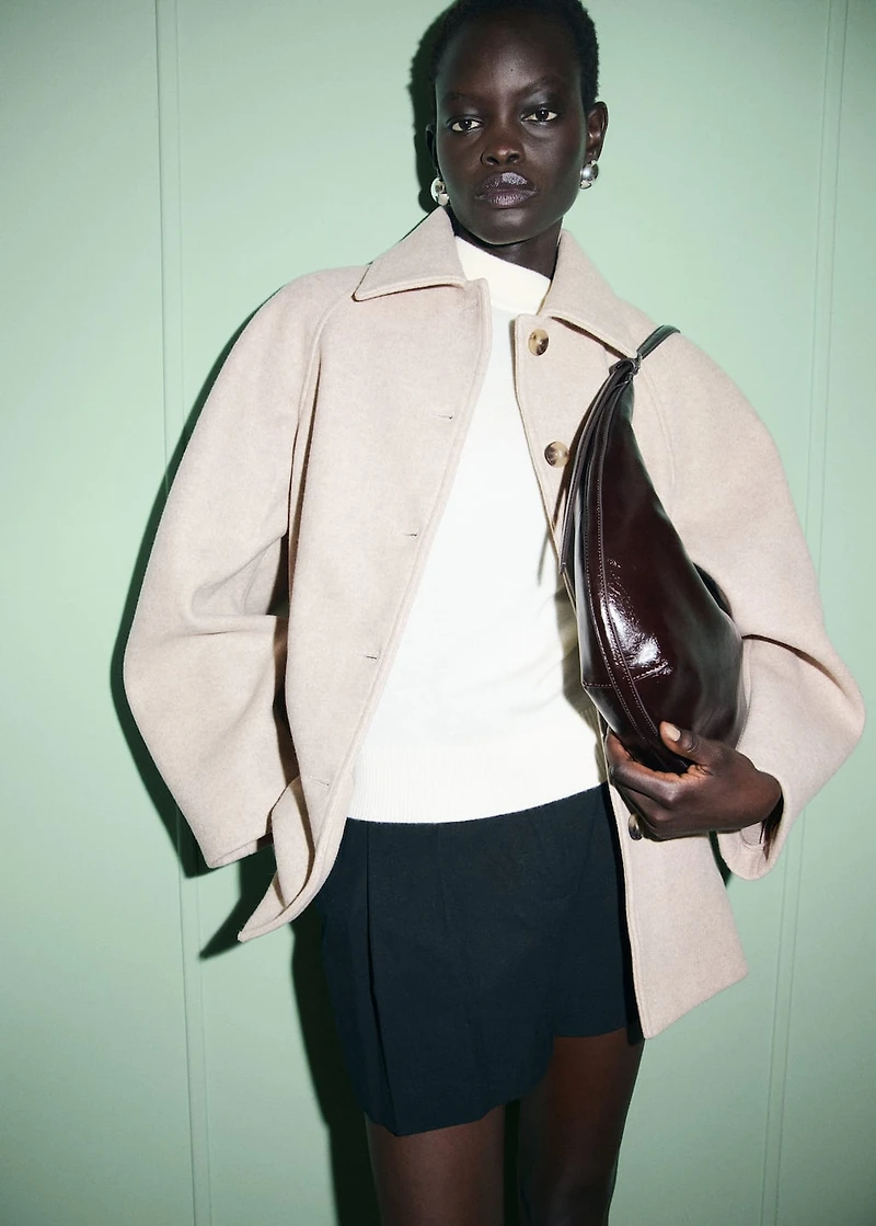 Short coat with notched lapel collar