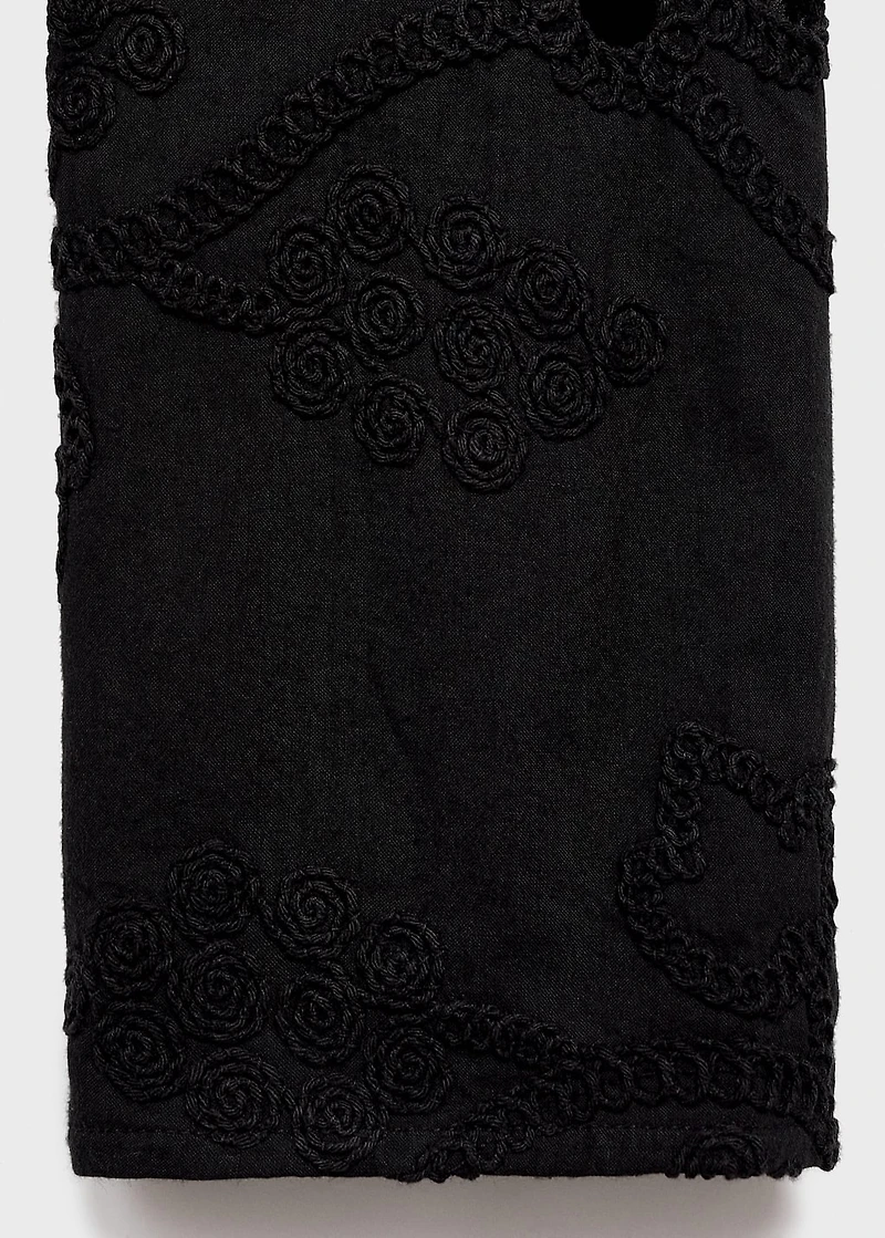 Embroidered blouse with buttons