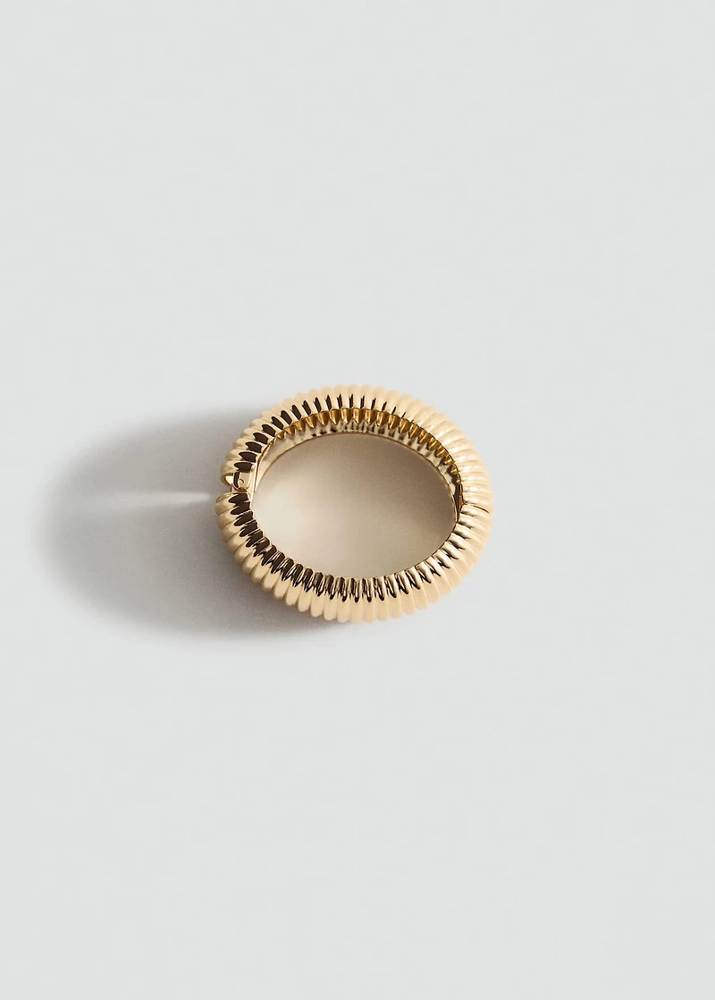 Rigid bracelet with relief