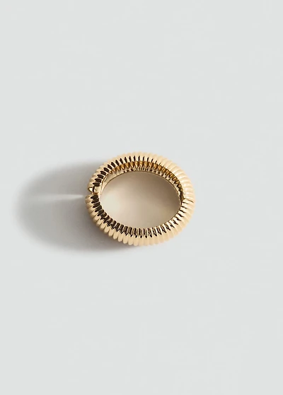 Rigid bracelet with relief