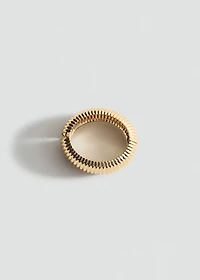 Rigid bracelet with relief