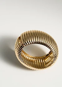 Rigid bracelet with relief