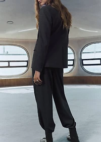 Check pleated pants