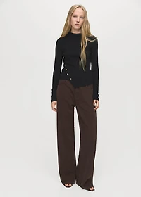 Asymmetrical sweater with buttons