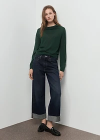 Knitted sweater with draped neck