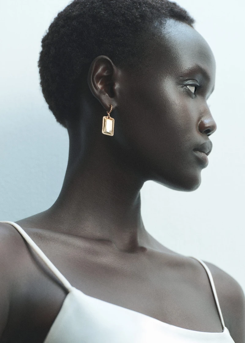 Pendant-design earrings
