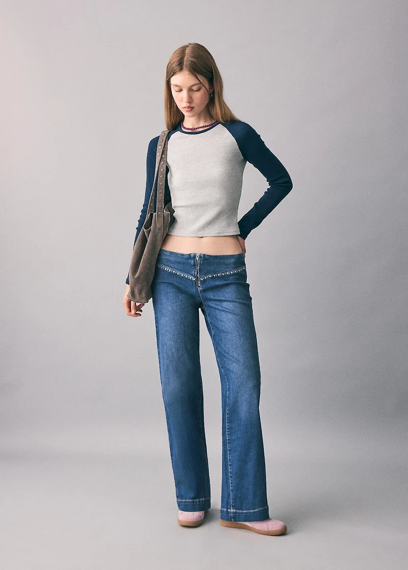 Low-waist studded jeans