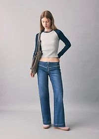 Low-waist studded jeans