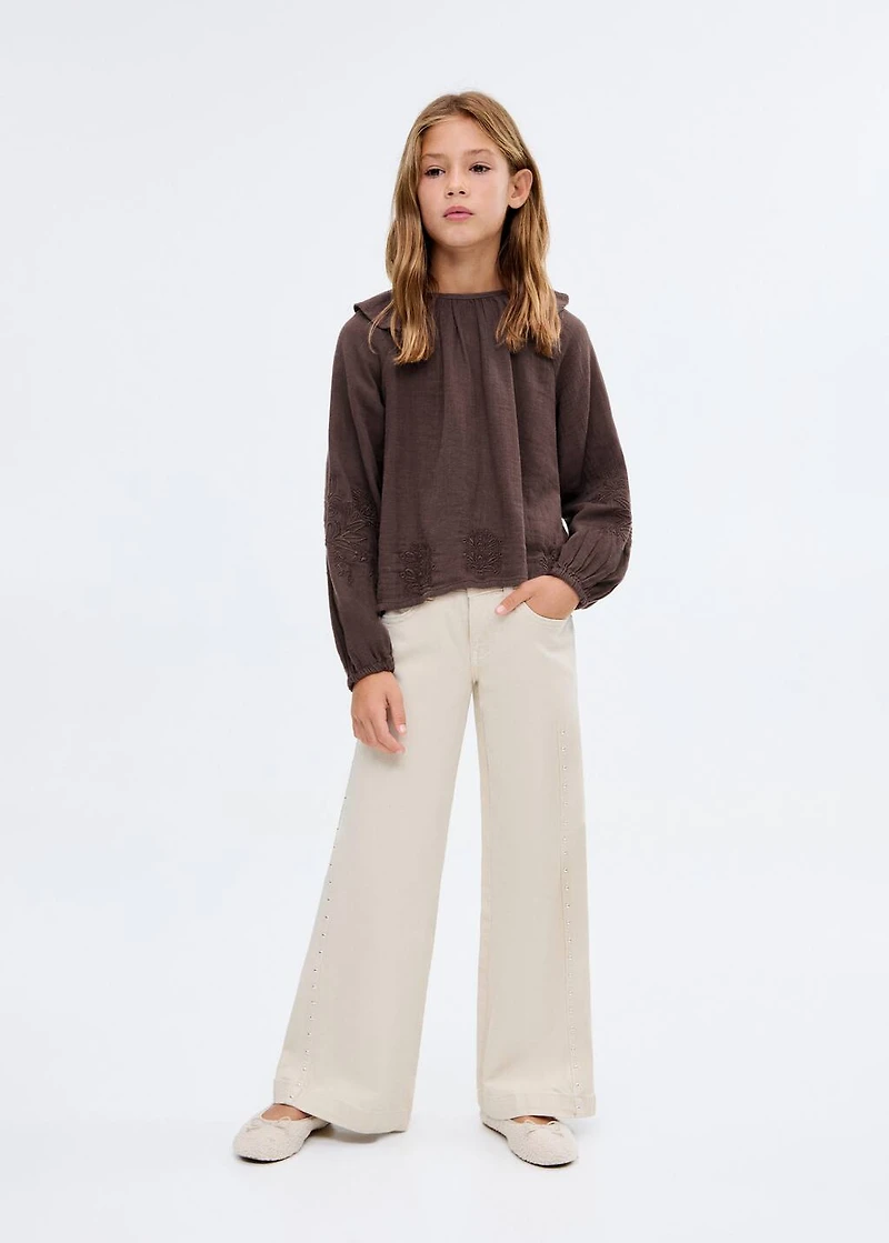 Ruffled embroidered blouse