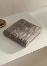 Cotton washbasin towel with embroidered dots