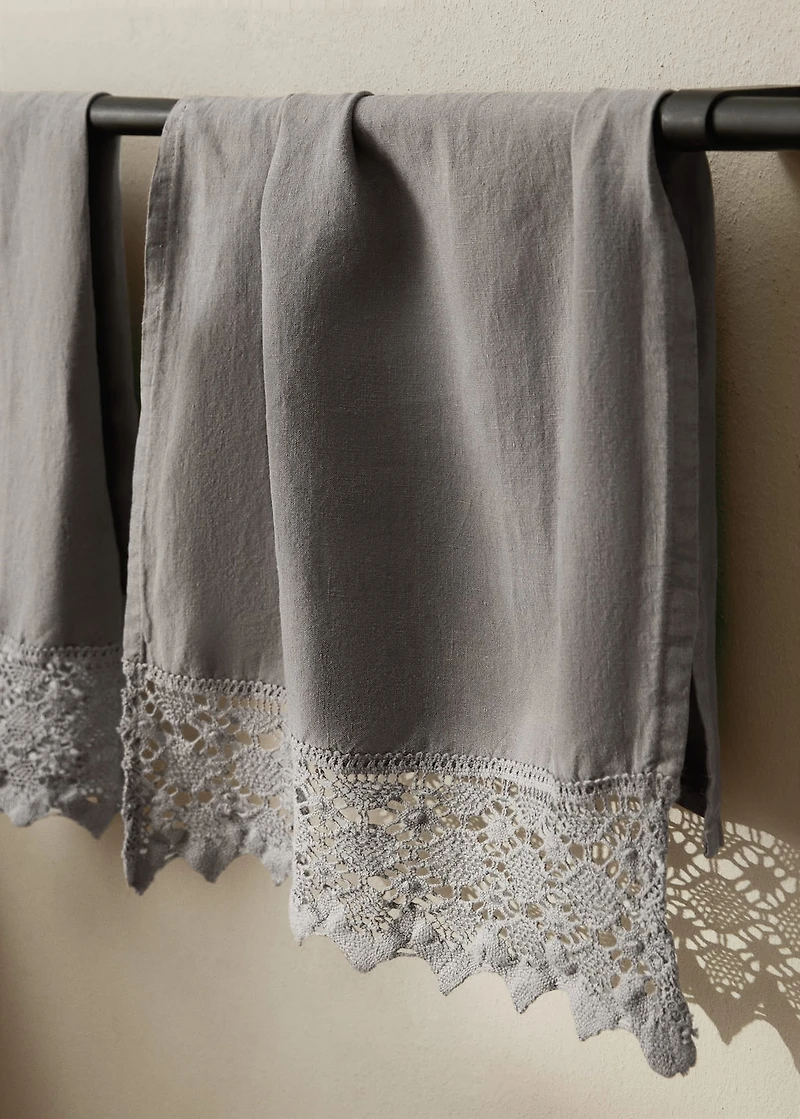 Linen towel with lace edging