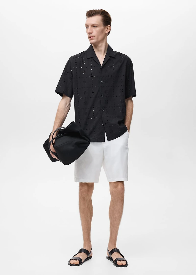 Shirt with embroidered eyelet details
