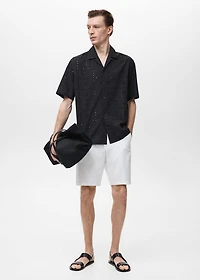 Shirt with embroidered eyelet details