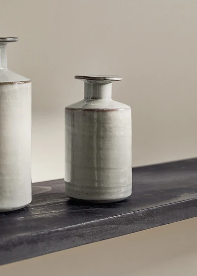 Stoneware vase with bottle design