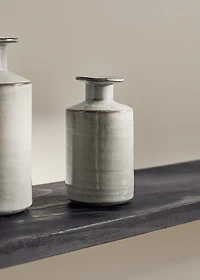 Stoneware vase with bottle design