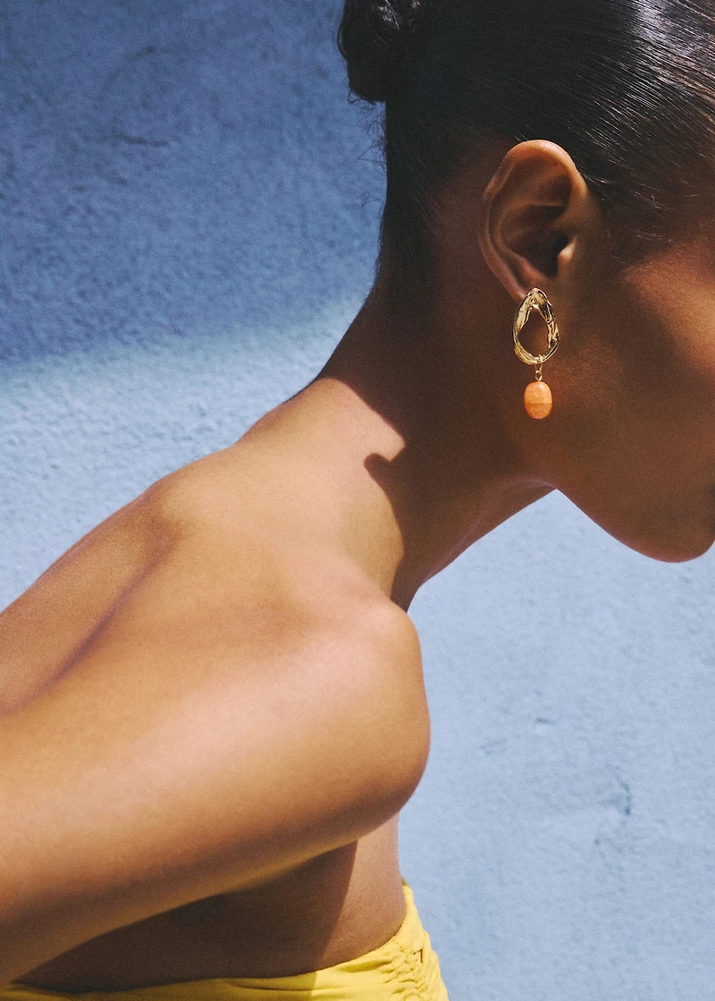 Circular bead-design earrings