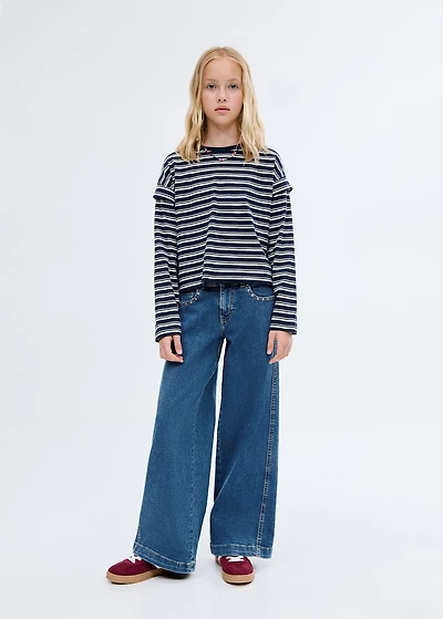 Low-waist studded jeans