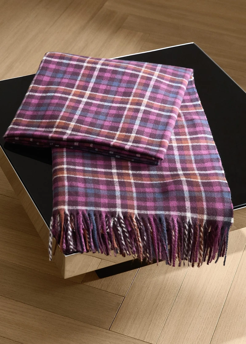 Soft fringed check blanket