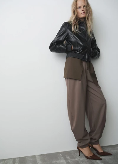 Pointed shoes with patent leather effect