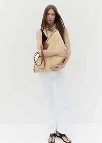 Large natural fiber basket with leather handle