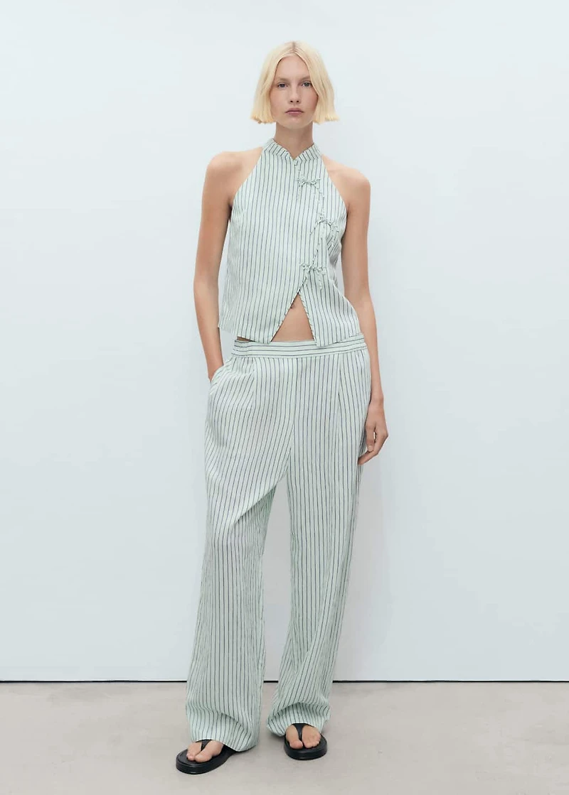 Striped top with a strap neckline and laces