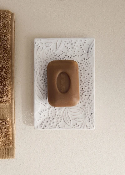 Embossed soap dish