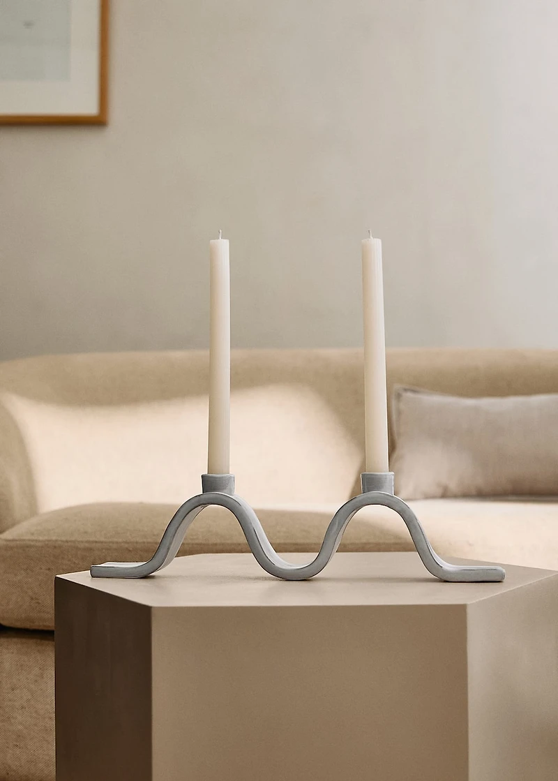 Stoneware candlestick with wave design and glossy finish