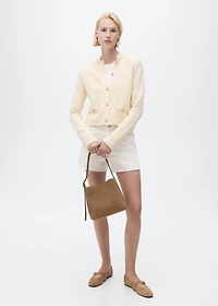 Knitted cardigan with frayed ends
