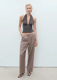 Halter top with metallic appliqués