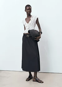 Polka-dot blouse with ruffles