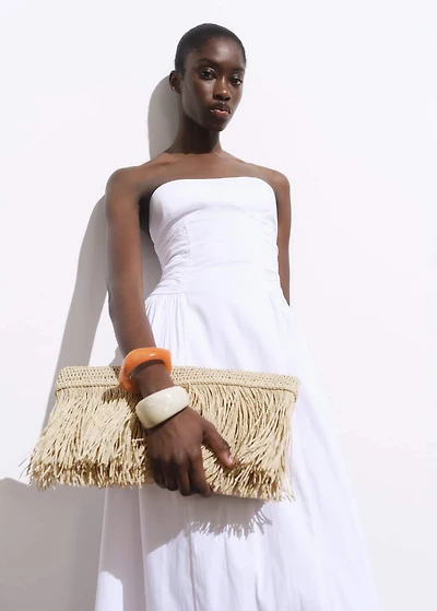 Natural fiber handbag with fringes