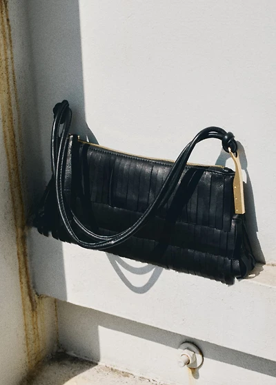 Leather shoulder bag with fringes
