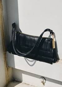 Leather shoulder bag with fringes