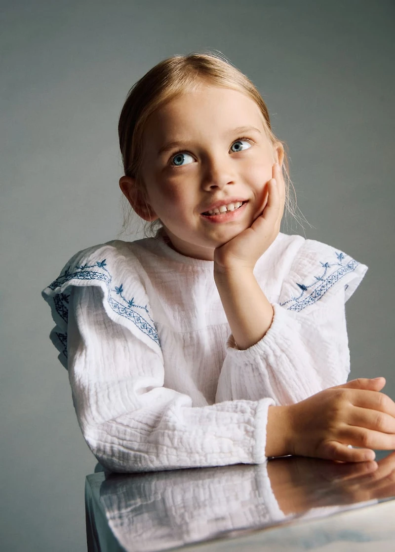 Ruffled embroidered blouse