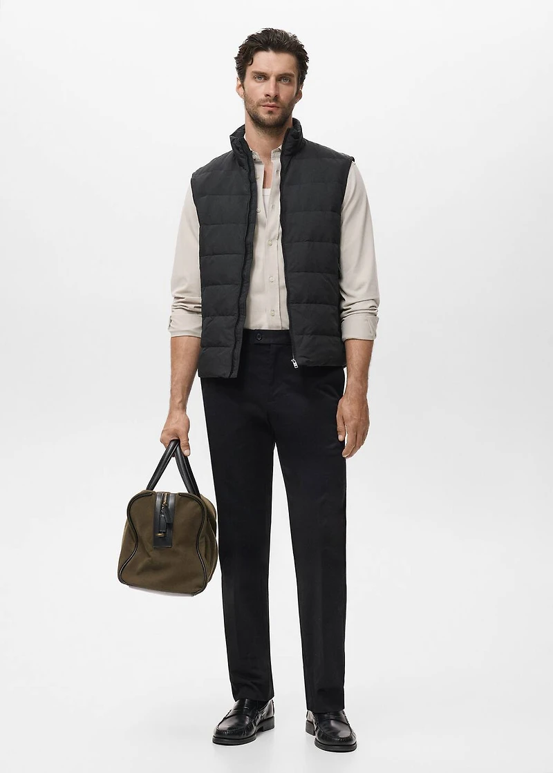Quilted vest with down and feather filling