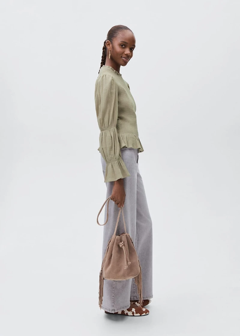 Ruched blouse with ruffles