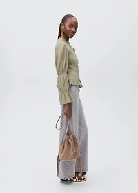 Ruched blouse with ruffles